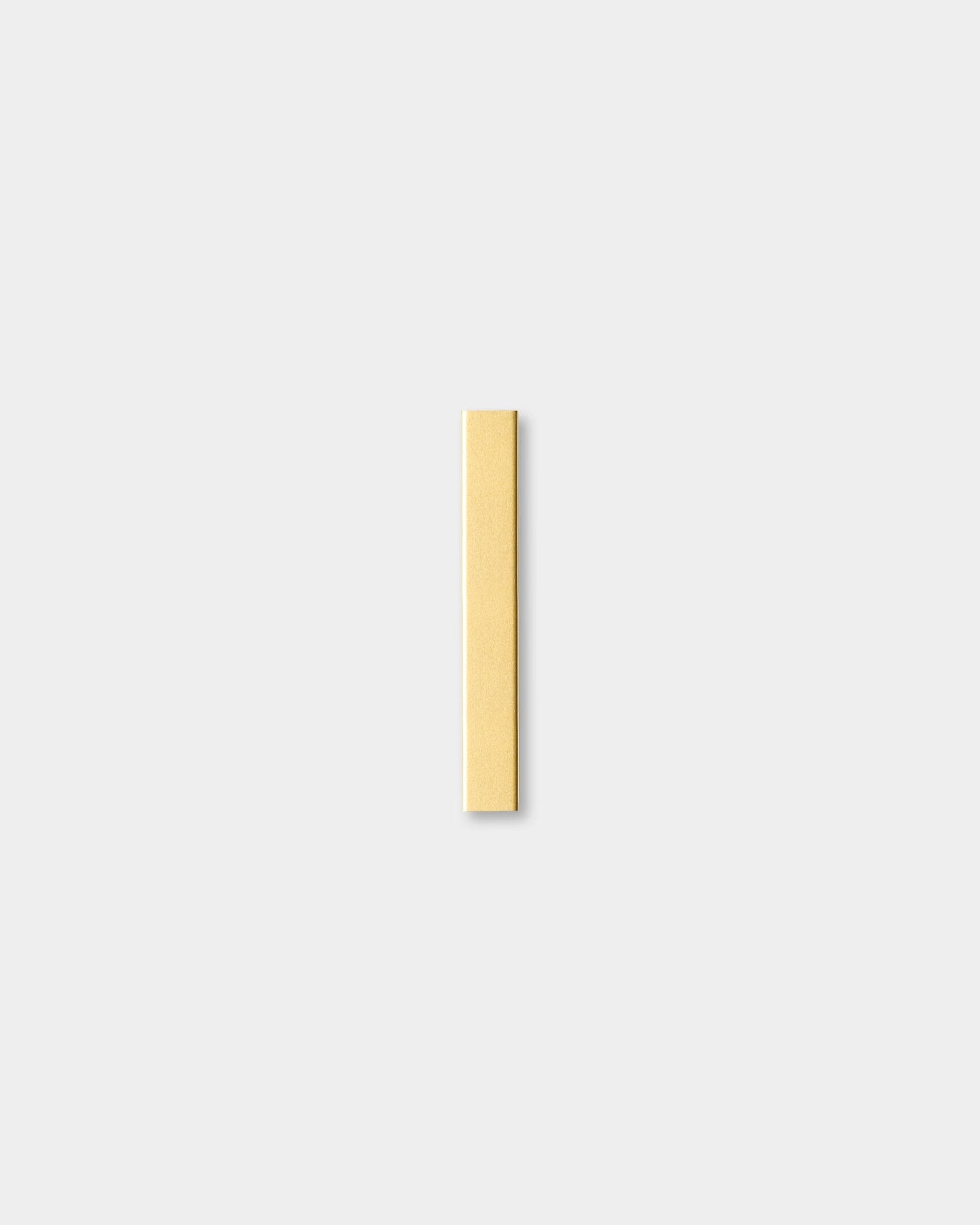 Single vertical acoustic panel from WoodUpp’s Liva collection in beige with brass accents, 20 cm wide, centered on a plain light gray background.